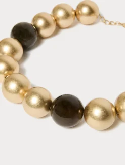 Collier e orecchini in metallo e resina - ORO