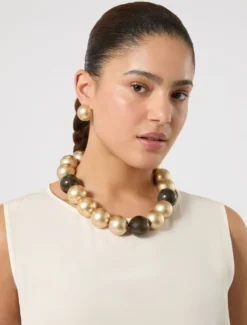 Collier e orecchini in metallo e resina - ORO